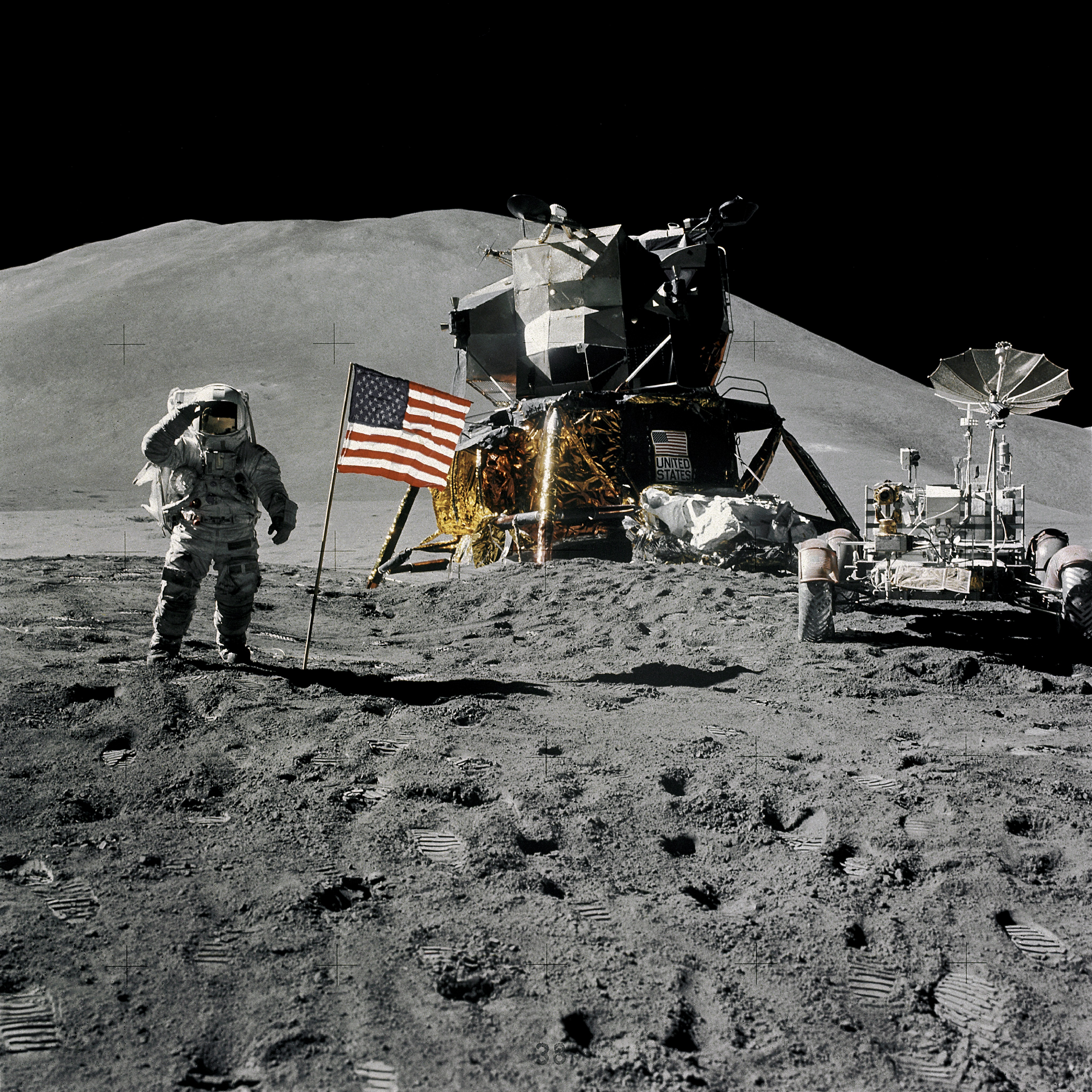 Astronaut James B. Irwin, lunar module pilot, gives a military salute while standing beside the deployed United States flag during the Apollo 15